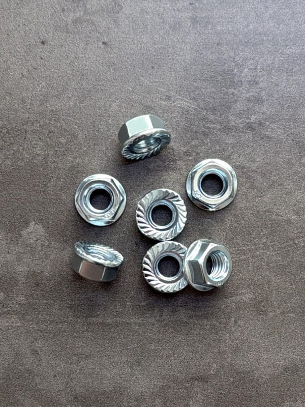 Гайка с фланцем М6 DIN 6923 с насечками, оц.